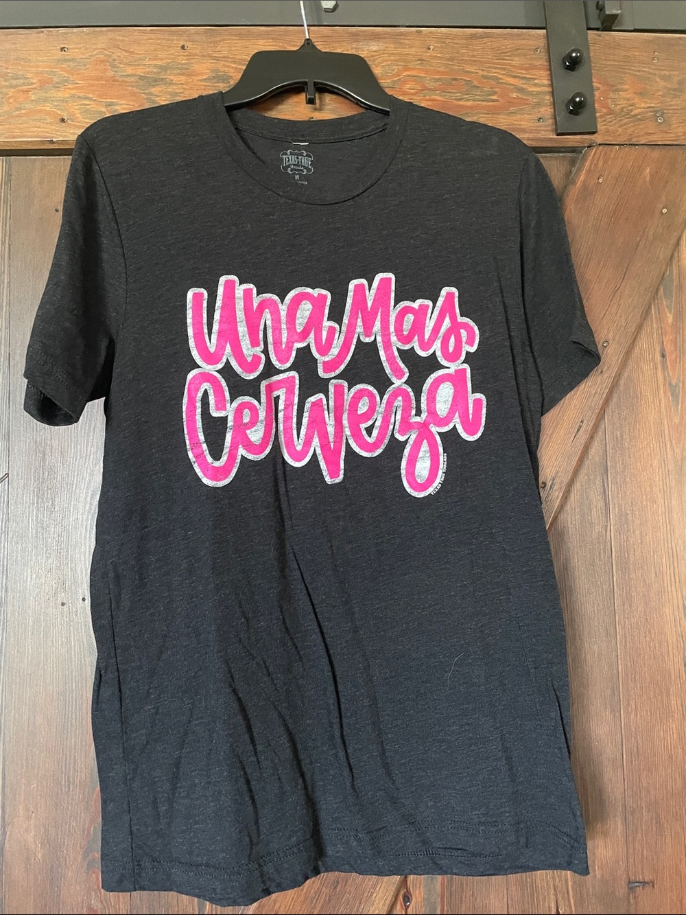 Una Mas Cerveza Black Graphic Tee - Pink Script